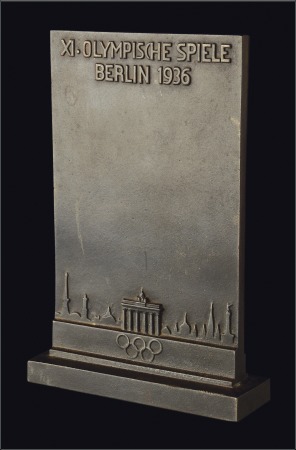 Stamp of Olympics Plaque: Large metal rectagular plaque mounted on m