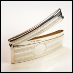 Stamp of Stamp Boxes 1908 Birmingham silver curved card case with hinged lid, very fine