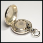 Stamp of Stamp Boxes 1899 Birmingham silver sovereign case in the style of a pocket watch