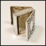 Stamp of Stamp Boxes American Silver Boxes: 1895 Sterling silver single compartment spring loaded case