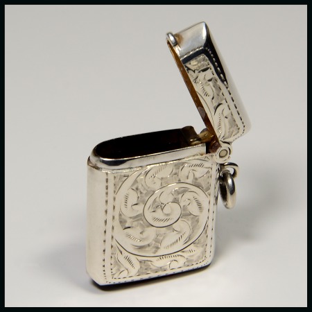 Stamp of Stamp Boxes 1908 Birmingham silver vesta case with hinged lid at top by P F Jackson