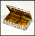 Stamp of Stamp Boxes American Silver Boxes: Sterling silver two compartment case by Tiffany & Co, with embossed flowers and ferns all around