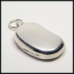 Stamp of Stamp Boxes 1909 Birmingham silver sovereign box, kidney shaped