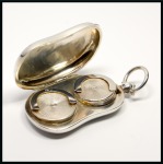 Stamp of Stamp Boxes 1909 Birmingham silver sovereign box, kidney shaped