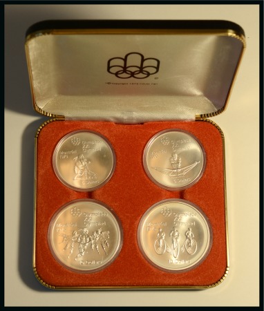 Stamp of Olympics » 1976 Montreal 1976 Montreal set of four uncirculated silver coins (two $5 and two $10) in plastic cases, held in the original presentation case