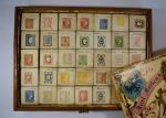Stamp of Large Lots and Collections THE EARLIEST RECORDED PHILATELIC GAME: 1868ca. Memory game of 70 wooden pieces featuring reproductions of stamps