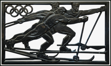 Stamp of Olympics » 1932-1936 Intervening Championships 1930s ca. cast iron item showing three stylised cross-country skiers racing with Olympic Rings at top left corner
