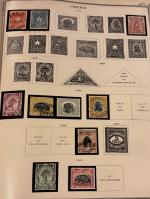 Stamp of Large Lots and Collections 1850s-1920s all-world collection in four large Scott album