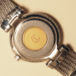Stamp of Feldman International Auctions » Montres / Watches PHILIPPE CHARRIOL. Montre à quartz en acier et or jaune.
