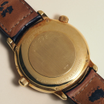 Stamp of Feldman International Auctions » Montres / Watches JAEGER LeCOULTRE MASTER GEOGRAPHIC. Montre mécanique en or jaune