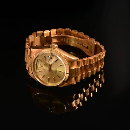 Stamp of Feldman International Auctions » Montres / Watches ROLEX DAY-DATE REF. 18078. Montre automatique en or 750