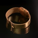 Stamp of Feldman International Auctions » Montres / Watches OMEGA. Montre mécanique en or jaune 750.