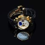 Stamp of Feldman International Auctions » Montres / Watches CARTIER PASHA. Montre à quartz en or jaune 750