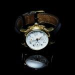 Stamp of Feldman International Auctions » Montres / Watches MONT-BLANC. Montre mécanique en acier doré.