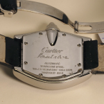 Stamp of Feldman International Auctions » Montres / Watches CARTIER. Montre automatique en acier.