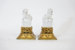 Stamp of Feldman International Auctions » Art d'Orient & d'Extrême-Orient / Asian & Oriental Art Chine. Paire de chiens de Fô en porcelaine « blanc de Chine »