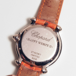 Stamp of Feldman International Auctions » Montres / Watches Montre femme  CHOPARD  "Happy Sport" à quartz