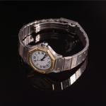 Stamp of Feldman International Auctions » Montres / Watches Montre CARTIER Santos octogonale or et acier automatique