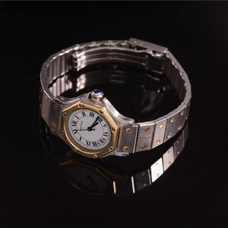 Stamp of Feldman International Auctions » Montres / Watches Montre CARTIER Santos octogonale or et acier automatique