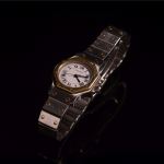 Stamp of Feldman International Auctions » Montres / Watches Montre CARTIER Santos octogonale or et acier automatique