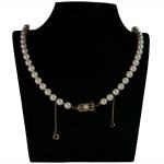 Stamp of Feldman International Auctions » Bijoux - Haute Joaillerie / Jewellery Collier composé d'un rang de perles mesurant 6.5mm,