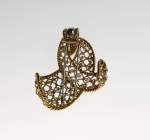 Stamp of Feldman International Auctions » Bijoux - Haute Joaillerie / Jewellery BROCHE DIAMANTS GÜBELIN.En or jaune 750, sertie de