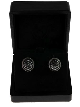 Stamp of Feldman International Auctions » Bijoux - Haute Joaillerie / Jewellery Mouawad, Paire de clips d'oreille en or gris 750 sertie