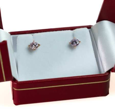 Stamp of Feldman International Auctions » Bijoux - Haute Joaillerie / Jewellery Paire de clous d'oreille en or rose 750 serti de deux diamants