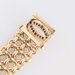 Stamp of Feldman International Auctions » Bijoux - Haute Joaillerie / Jewellery BRACELET CARTIER '"PENELOPE"