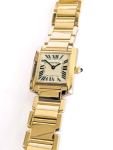 Stamp of Feldman International Auctions » Montres / Watches MONTRE BRACELET CARTIER EN OR JAUNE 750 "TANK FRANCAISE"