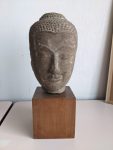 Stamp of Feldman International Auctions » Art d'Orient & d'Extrême-Orient / Asian & Oriental Art Tête de Bouddha en grès, Thaïlande, royaume d’Ayutthaya, XVIe–XVIIe siècle