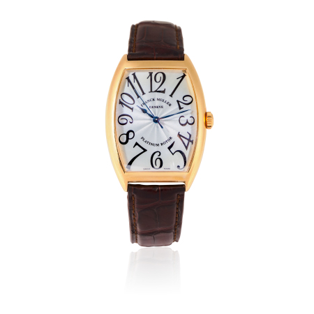 Stamp of Feldman International Auctions » Montres / Watches FRANCK MULLER CINTRÉE CURVEX. Montre automatique en or jaune 750