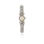 Stamp of Feldman International Auctions » Montres / Watches Montre cocktail vintage EBEL des années 1950 avec diamants