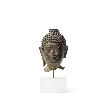 Stamp of Feldman International Auctions » Art d'Orient & d'Extrême-Orient / Asian & Oriental Art Tête de Boudhha Shakyamuni en bronze, 15/16ème siècle, style Chiang Saen