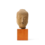 Stamp of Feldman International Auctions » Art d'Orient & d'Extrême-Orient / Asian & Oriental Art Tête de Bouddha en grès, Thaïlande, royaume d’Ayutthaya, XVIe–XVIIe siècle