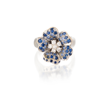 Stamp of Feldman International Auctions Bague fleur saphirs et diamants