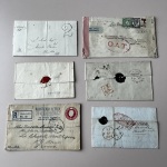 Stamp of Ireland » Pre-Stamp Postal History » Collections, lots etc. 1813-1945 Mixed lot of ten covers, mostly from the stampless period, showing Ballina and Cahir mileage mkgs in red, "1" and "2" hs's in black on two covers, Portlaw undated circle, 1945 OAT censored cover to New Zealand 
