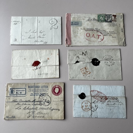 Stamp of Ireland » Pre-Stamp Postal History » Collections, lots etc. 1813-1945 Mixed lot of ten covers, mostly from the stampless period, showing Ballina and Cahir mileage mkgs in red, "1" and "2" hs's in black on two covers, Portlaw undated circle, 1945 OAT censored cover to New Zealand 