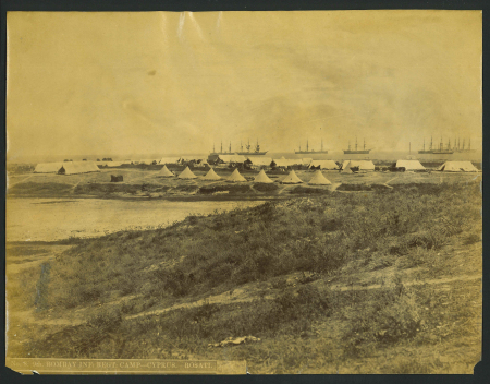 Indian Expeditionary Force.  Early sepia photograph depicting the 9th Bombay Infantry Regiment camp at Larnaca, Cyprus, with printed legend below, "9th Bombay Inf. Regt. Camp Cyprus – Rosati". An important contemporary r