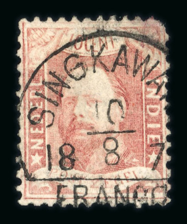 Singkawang. 1868, 10 cent red with good perforation. Excellent postmark, 3 known.